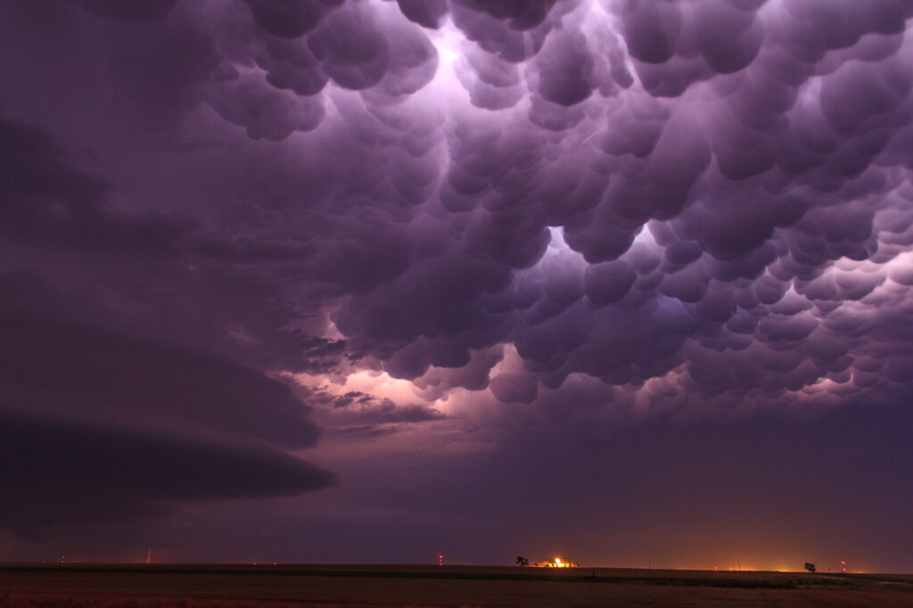 Mammatus clouds with shelf cloud stack