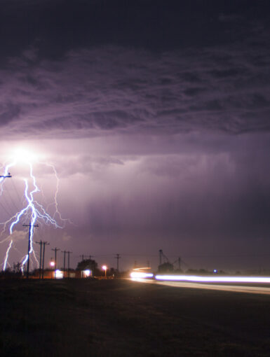 Lightning next to the highway