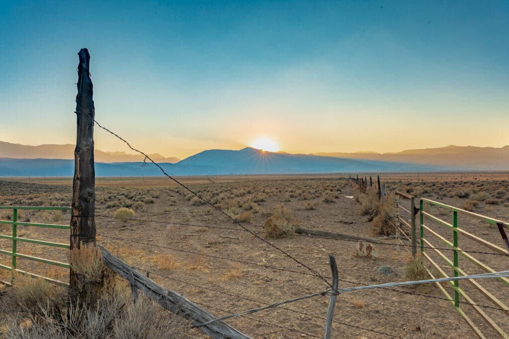 Sun sets behind the Sierra Nevada Mountains near Bridgeport, California