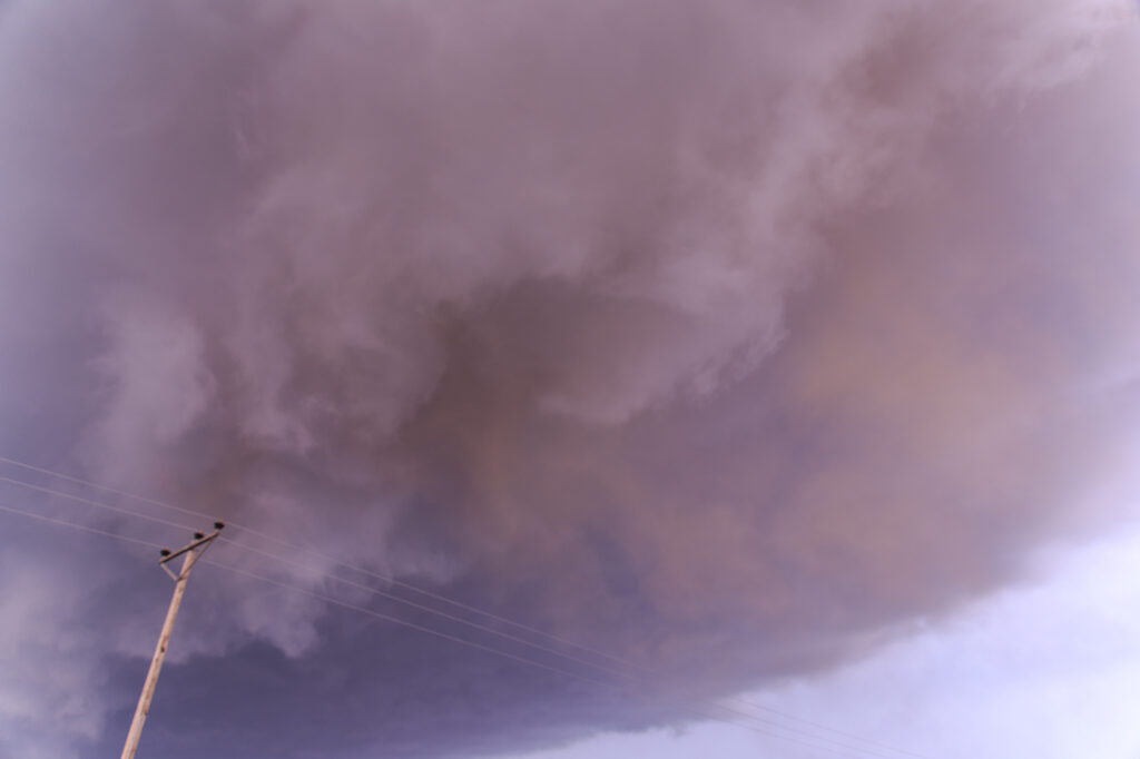 Red dirt from updraft mixing into the mesocyclone